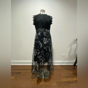 Beautiful lengthened dress with no defects or stains